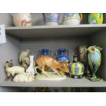 A collection of ceramic vases and animal models to include a Beswick pig and piglets, a 19th century