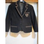 Gucci - a child's black blazer, with emblem motif to the top pocket, chest approx 28/30" x 20"