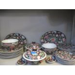 A late 20th century Chinese dinner service with black ground