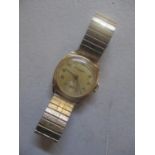 A 9ct gold gents manual wind wristwatch, the dial inscribed Tho Russells Son