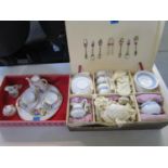An early 20th century boxed porcelain teaset and an early 20th century child's coffee set for two
