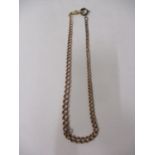 A 9ct gold and gold coloured metal chain