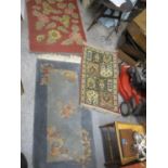 Three rugs to include a Chinese example, a machine made rug and another