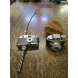 A leather cased hit miniature Japanese camera and a KKW gas lighter in the form of a camera