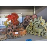 Three oriental soap stone figures and a jade style dragon