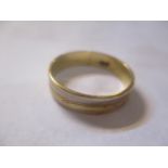 A gents 18ct gold ring