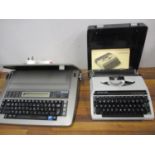 Two late 20th century cased typewriters to include a Panasonic electronic typewriter