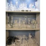 A large quantity of cut glass to include twenty three decanters, together with five Sylvac models of