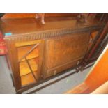 An Old Charm oak display cabinet with twin glazed doors and a 1930s oak bureau bookcase with a