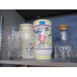 A Poole pottery vase and dish, together with a cut glass vase, a glass bottle with a cut glass vase,