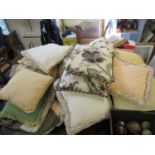 A quantity of scatter cushions, cushion covers and other items