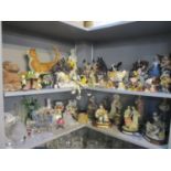 A large quantity of ceramic models of animals and people to include George Williams Pets with