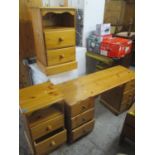 A modern pine dressing table together with two bedside chests