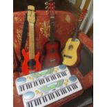 Musical instruments to include three children's guitars and two keyboards