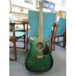A vintage John Hornby Skewes electro acoustic guitar, serial number BL500 CEAJ