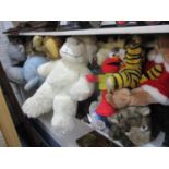 A selection of soft toys to include Hokey Pokey Elmo, together with a group of Christmas decorations