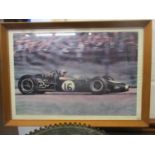 A view of a car at the Dutch Grand Prix, signed by Jack Brabham, framed and glazed