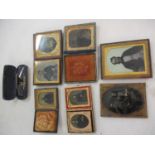 A quantity of Victorian photographs in cases, together with a pair of yellow metal spectacles