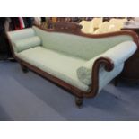 A William IV mahogany sofa having a gadrooned top rail, scrolled arms and fluted legs, 35" x 82"