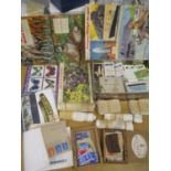 A mixed lot to include cigarette cards, some silk, mixed stamps and other items