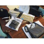 A quantity of modern bags to include an LK Bennett patent clutch bag, a Longchamp black leather