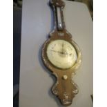 A Silverdale Equitable Industrial Cooperative Society mother of pearl inlaid wall barometer in