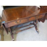 An early 20th century mahogany drop leaf side table