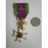 A Belgium Leopold Military medal, gilt metal and enamel cross for Veterans of Leopold III, the