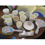 A mixed lot to include an early 20th century silver dressing table set, commemorative china and a