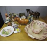 A quantity of ceramic ornaments to include a Beswick Bull, Sabrina's Sir Richmond, along with a