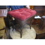 A Victorian walnut piano stool