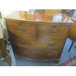 A Georgian mahogany bow fronted chest of two short and two long drawers, 34 1/2"h x 35"w