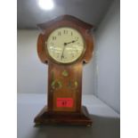 An Edwardian inlaid mahogany Art Nouveau cased mantle clock, inlaid amboyna flower bud decoration,