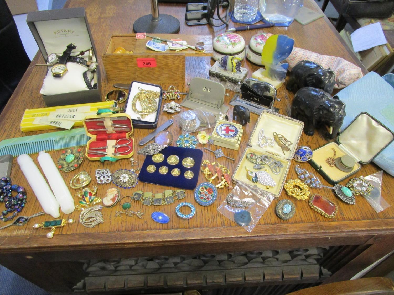 A mixed lot of costume jewellery, watches and other items to include a Scandinavian silver and