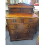 A Victorian mahogany chest of drawers having a raised back and bun shaped handles, 52" h x 37"w