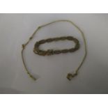 A 9ct gold fancy link bracelet 6.7g, and a yellow metal chain necklace