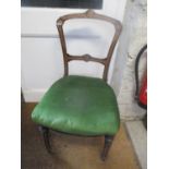 A Victorian ebonized and burr walnut inlaid single chair having tapered and turned legs