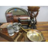 A 1923 Singer sewing machine, serial number Y9158758 in an oak case, together with a mid 20th