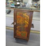 An early 20th century oak wall hanging smokers cabinet