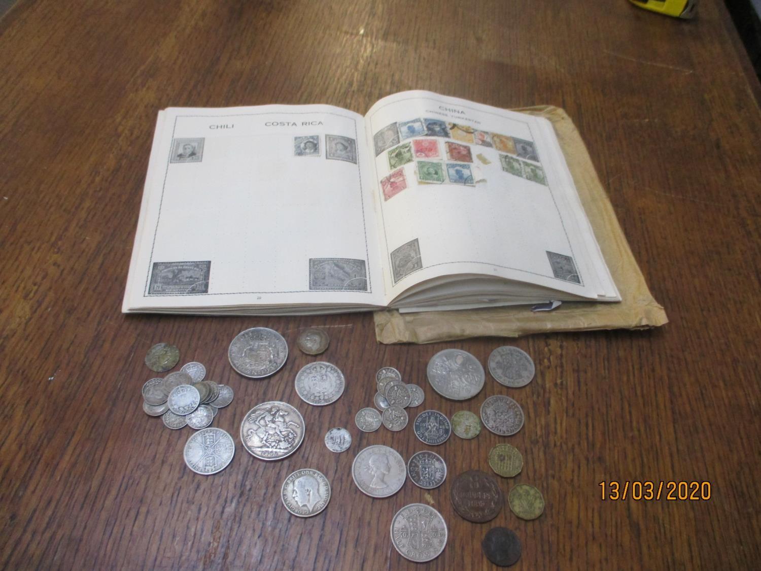 Coins and stamps to include an 1891 Crown, Victorian and later shillings and others