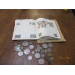 Coins and stamps to include an 1891 Crown, Victorian and later shillings and others
