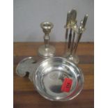Mixed silver to include a candlestick and a manicure set, together with a white metal wine taster