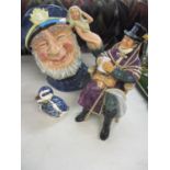 A Royal Doulton Old Salt Toby jug D6551 and a Royal Doulton figure The Coachman, together with a