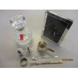 Silver to include a modern picture frame, a glass decanter, a saucer jug stamped 900 and other items