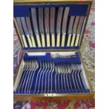A canteen of silver plated cutlery, six setting, in an oak case