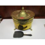 Early 20th century brass coal bucket with cover standing on four feet, along with a wooden coal