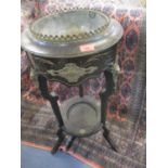 A 19th century ebonized, two tier plant stand