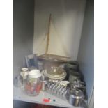 A mixed lot to include a model of a sailing boat, two hip flasks, silver plate and other items