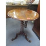 A Victorian mahogany occasional table having a circular top, barley twist column and three