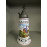 A German regimental porcelain beer stein Location: RWB